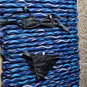 Previously owned, excellent condition black with glitter bikini